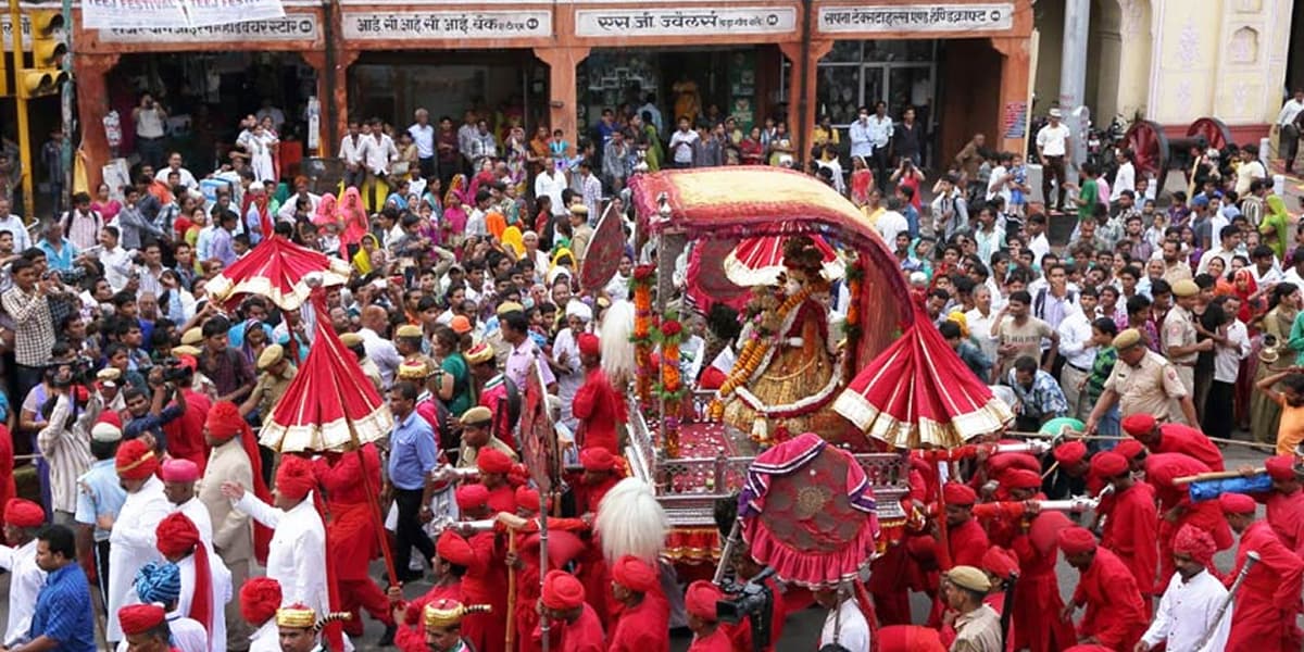 Grand street parade during Teej Festival in Rajasthan and India Teej festival parade in Jaipur